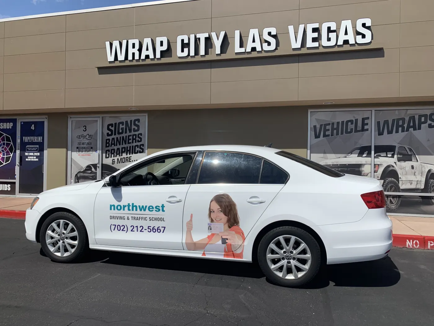 Second car on the same livery, kept consistent so the fleet reads as one brand on the road.
